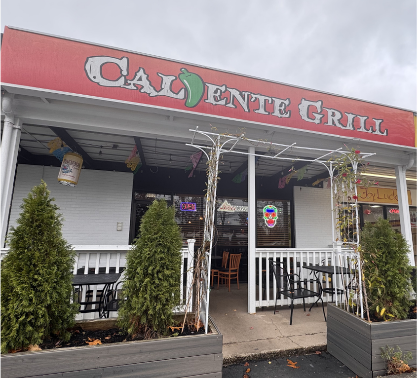 Caliente Grill sign and outdoor patio