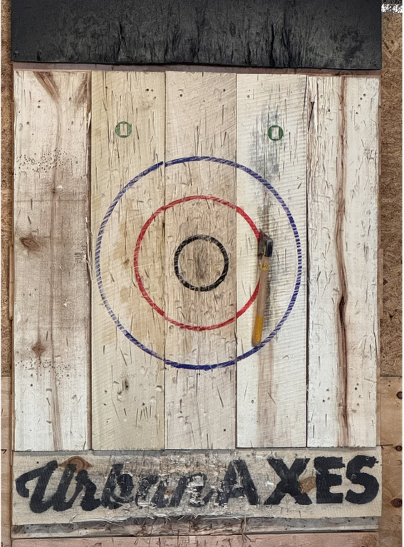 Urban Axes target on wood board